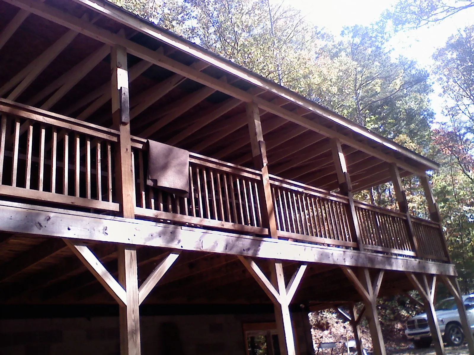 Timber framing under a new elevated porch and deck — Roof Leak Repair in Cedarhurst by Roofing Brothers